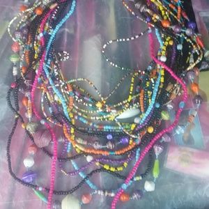 Braids and African masaai necklaces.